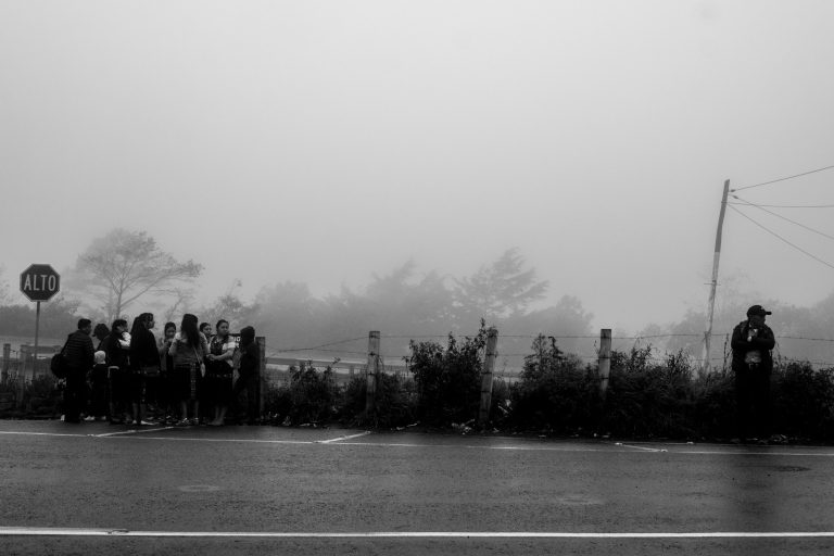 Street photo in Los Encuentros, Guatemala by Duncan Aitken