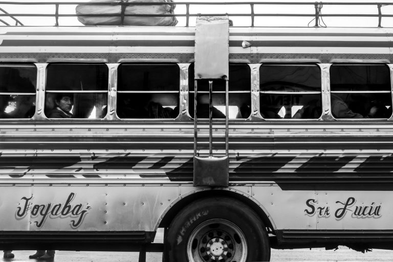 Street photo in Los Encuentros, Guatemala by Duncan Aitken