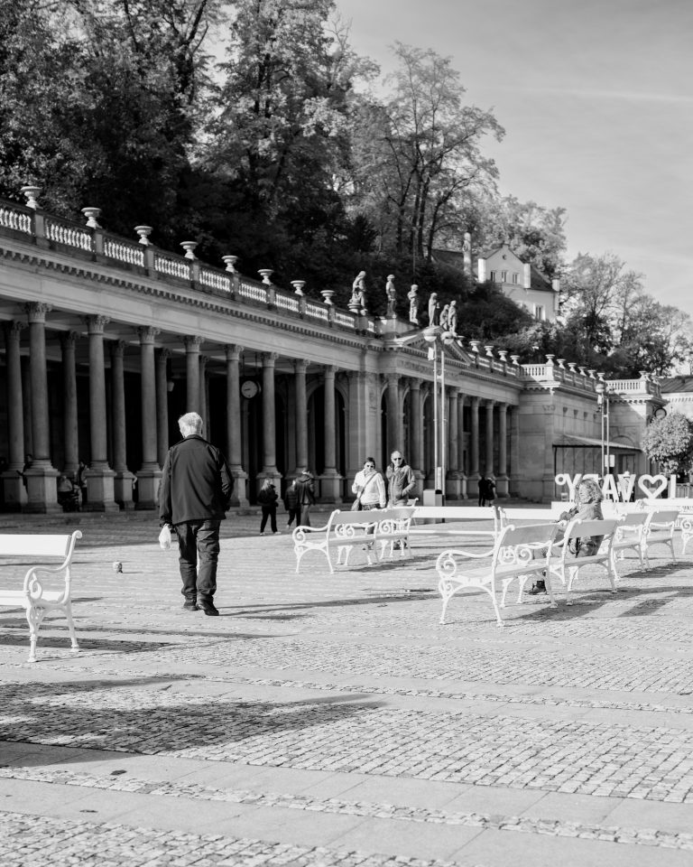 Street photo in Karlovy Vary, Czechia by Piotr Mil