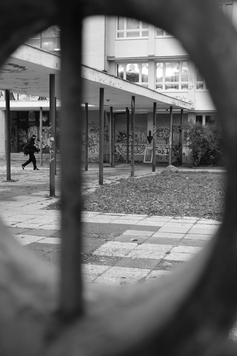 Street photo in Eisenhüttenstadt, Germany by Frank Berlin