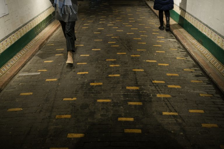Street photo in Bucharest, Romania by Alexandru Hornea