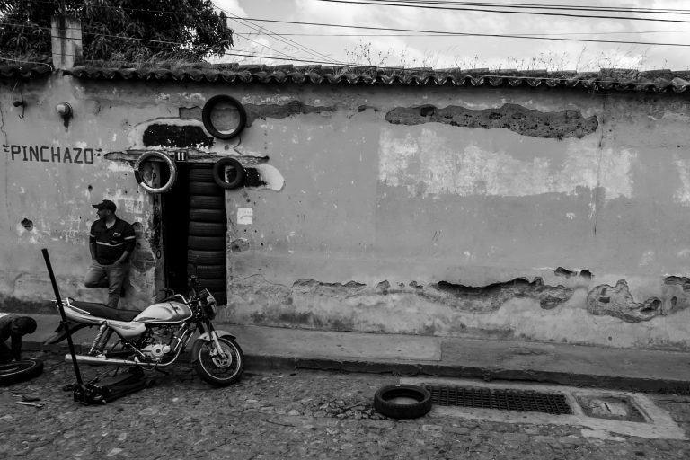 Street photo in Antigua Guatemala, Guatemala by Duncan Aitken