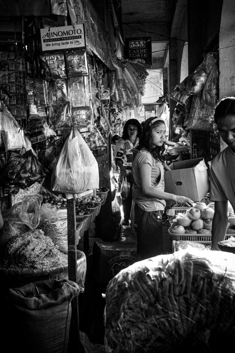Street photo in Jose Panganiban, Philippines by Lawrence Angelo Navarro