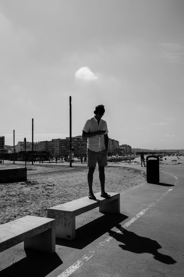 Street photo in Costa da Caparica, Portugal by Deividson Rodrigues