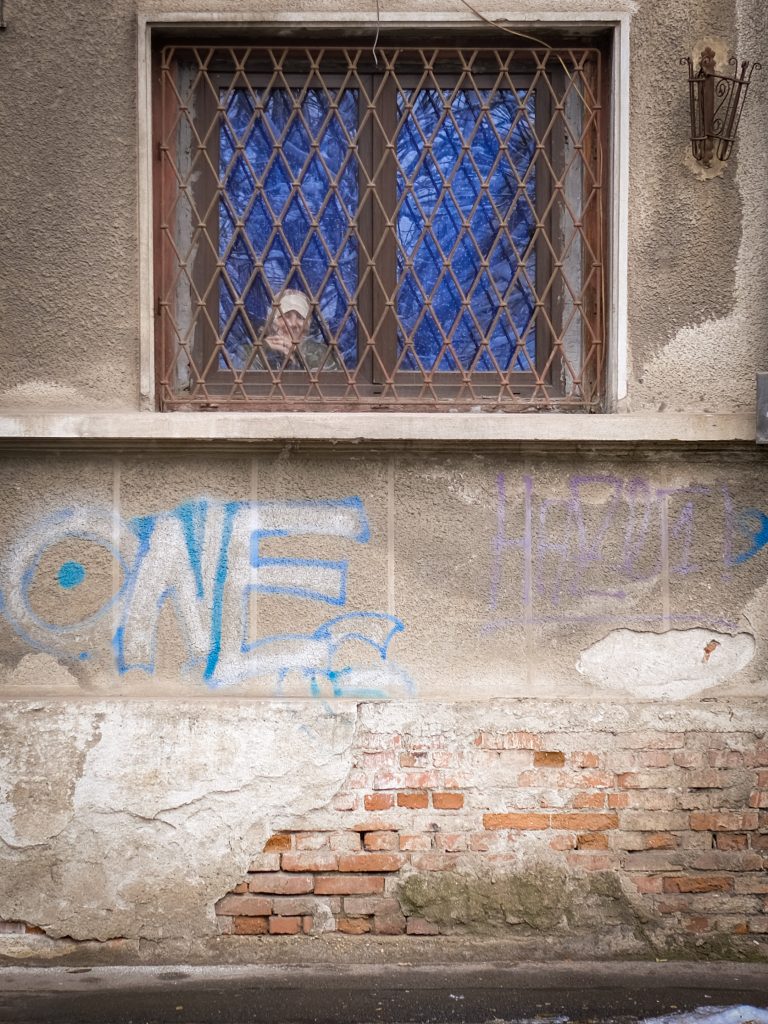 Street photo in Bucharest, Romania by Alexandru Hornea