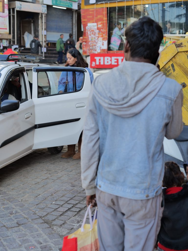 Street photo in Dharamshala, India by Vadiraj Mathad