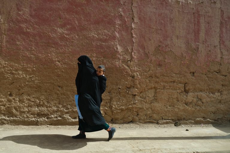 Street photo in Rissani, Morocco by Eric Andersen