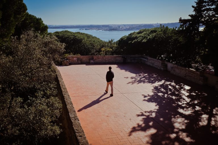 Street photo in Lisbon, Portugal by Eric Andersen