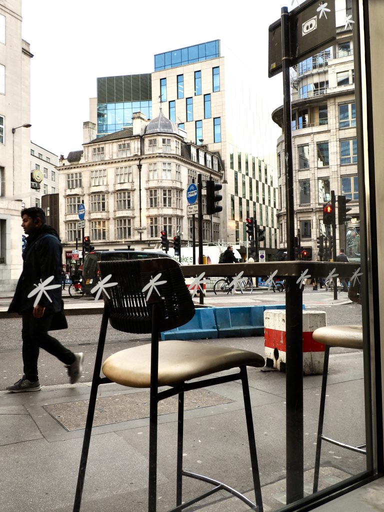 Street photo in London, United Kingdom by Nicky Stevenson