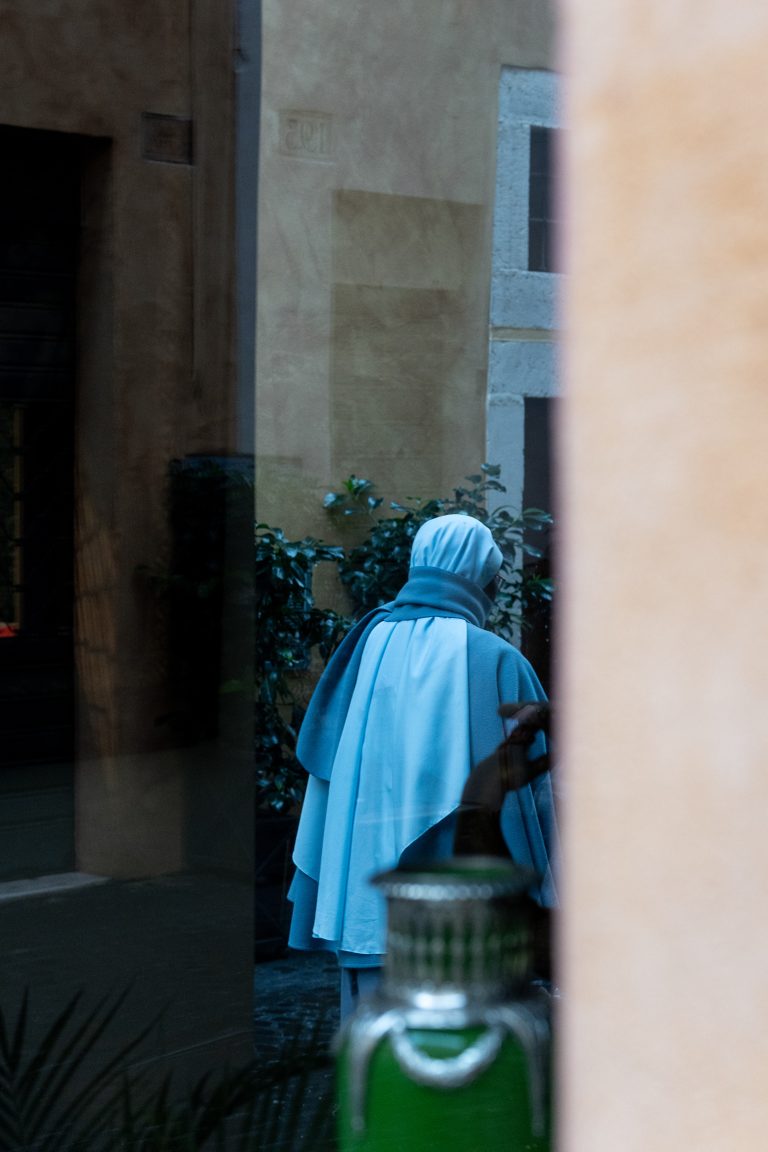 Street photo in Rome, Italy by Samuel Sulce