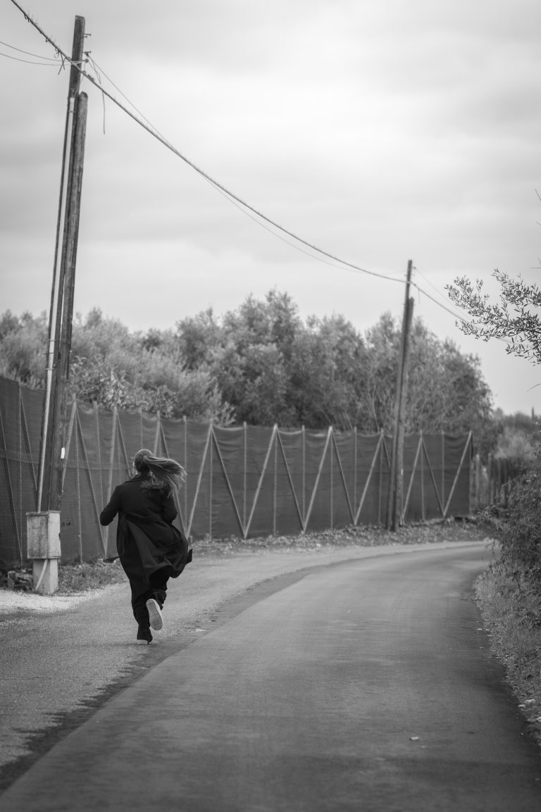 Street photo in Genzano di Roma, Italy by Samuel Sulce