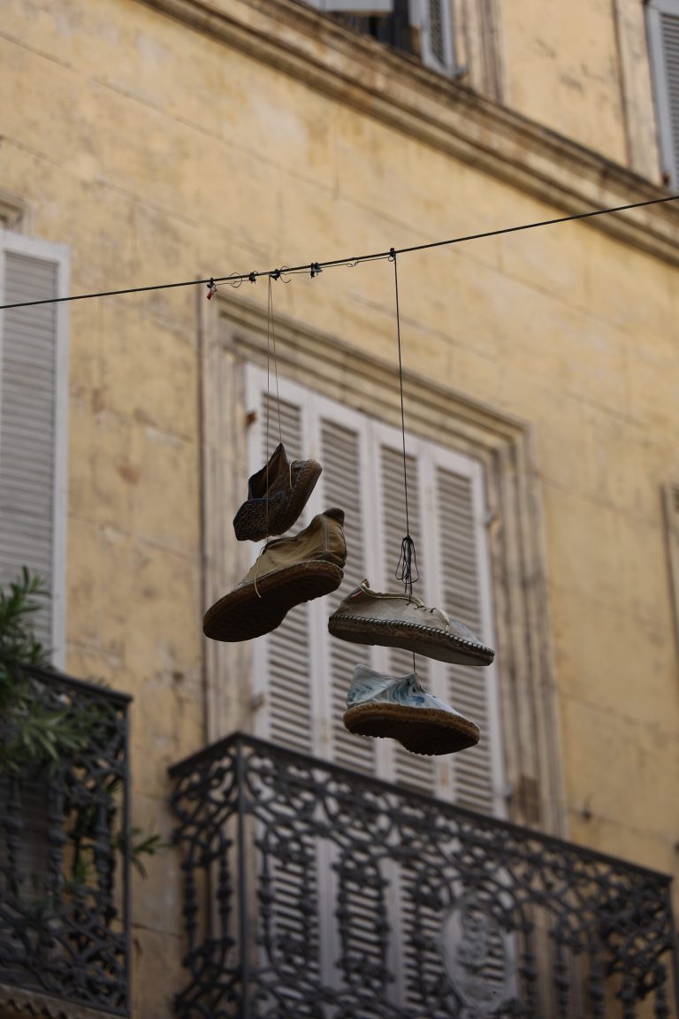 Street photo in Arles, France by Andrew Chambers