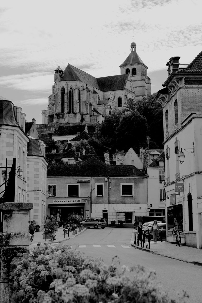 Street photo in Tonnerre, France by Andrew Chambers