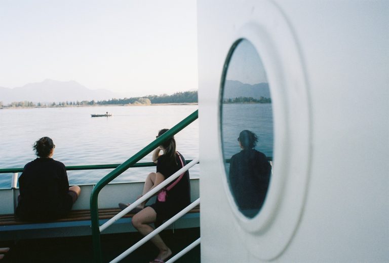 Street photo in Chiemsee, Germany by FX Kern