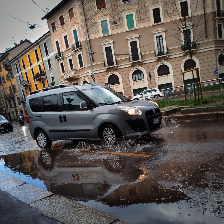 Street photo in Milan, Italy by Javier Aleuanlli