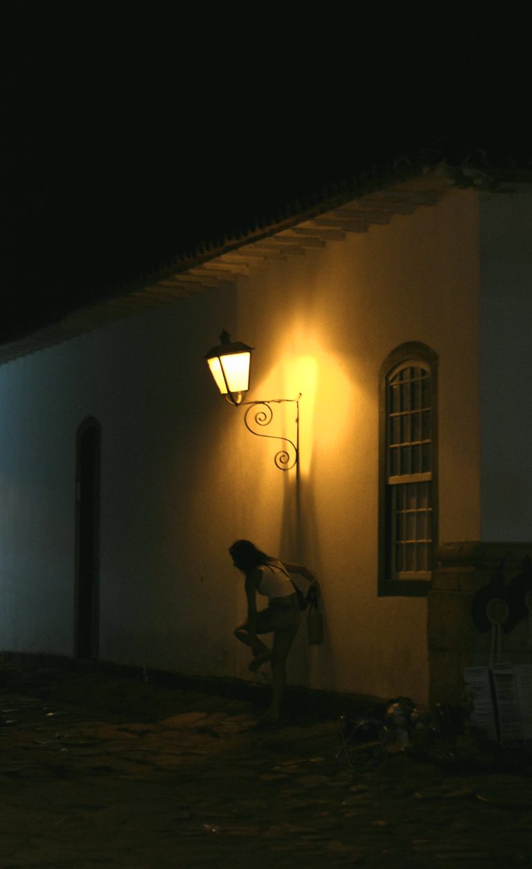 Street photo in Paraty, Brazil by Rodrigo Marcotich