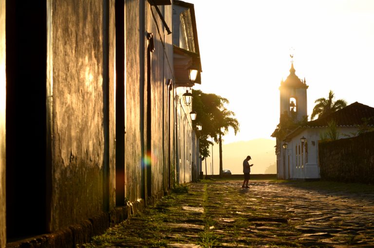 Street photo in Paraty, Brazil by Rodrigo Marcotich