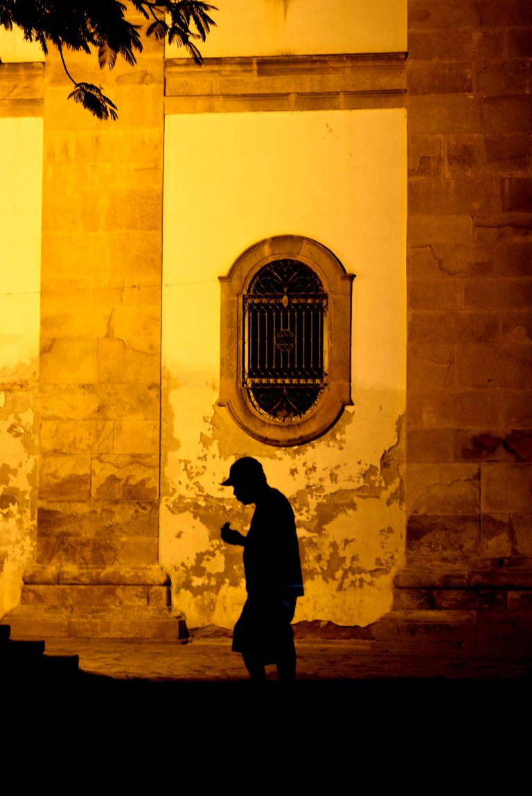 Street photo in Paraty, Brazil by Rodrigo Marcotich