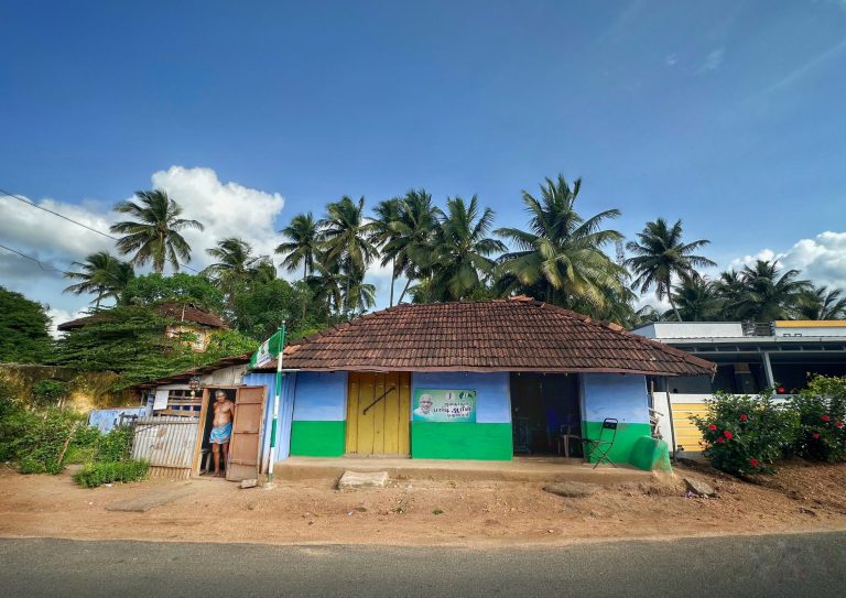 Street photo in Ozhalapathy, India by EM Rajeev