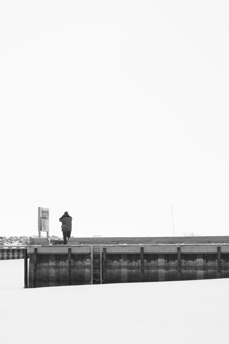 Street photo in Gimli, Canada by Mike Carter