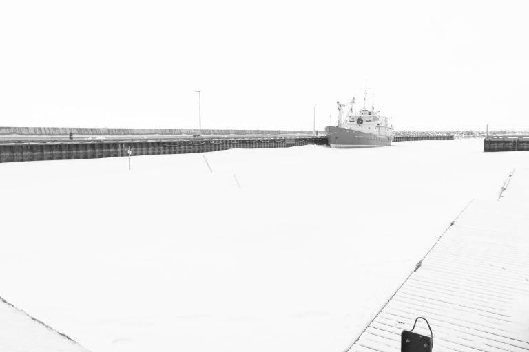 Street photo in Gimli, Canada by Mike Carter