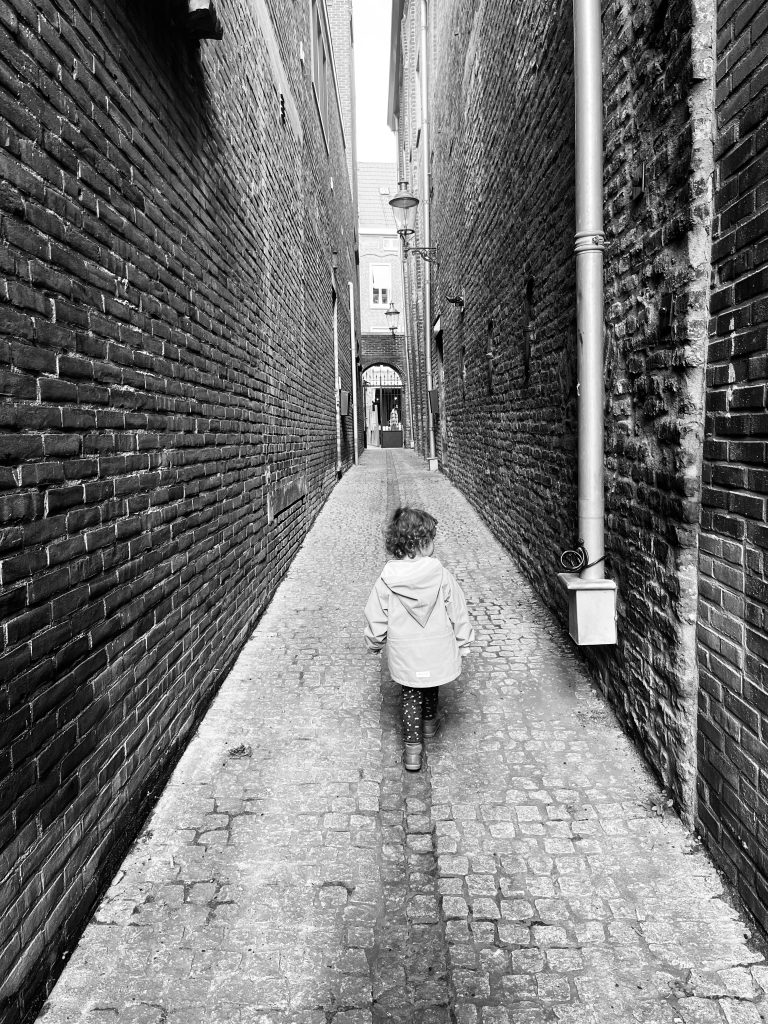Street photo in Roermond, Netherlands by Adam Roman