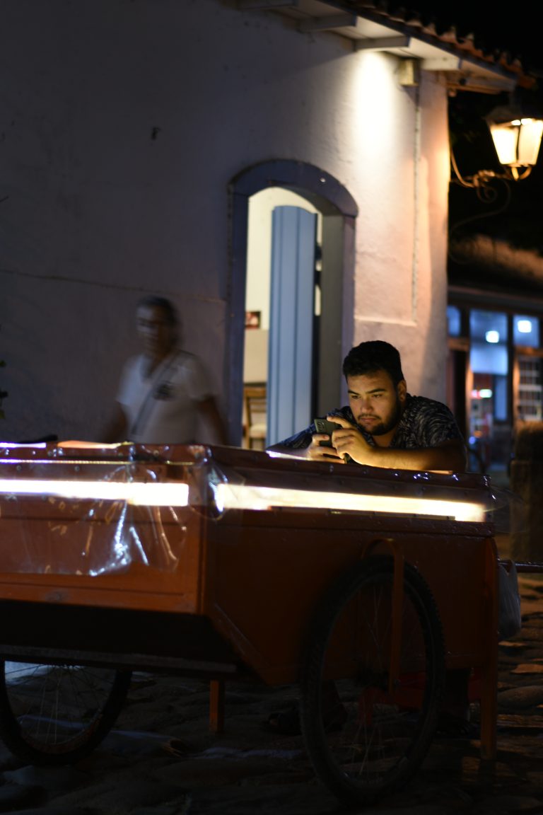Street photo in Paraty, Brazil by Rodrigo Marcotich