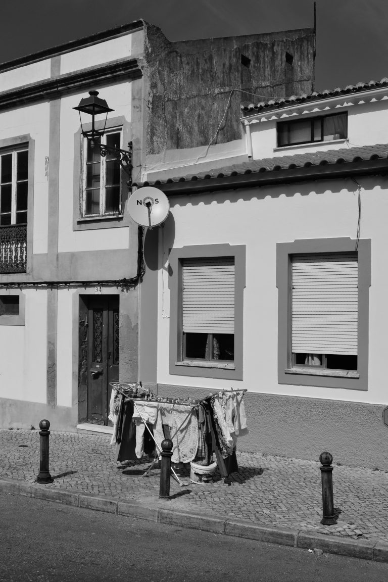 Street photo in Lagos, Portugal by Adam Roman