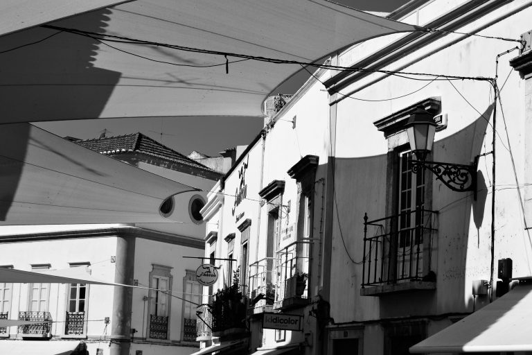 Street photo in Faro, Portugal by Adam Roman