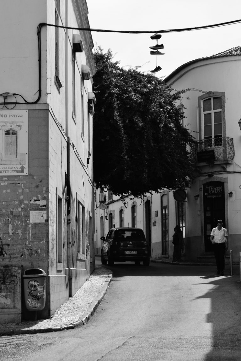 Street photo in Lagos, Portugal by Adam Roman