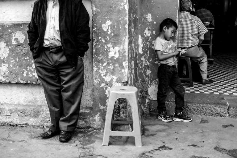 Street photo in Santa María de Jesús, Guatemala by Duncan Aitken