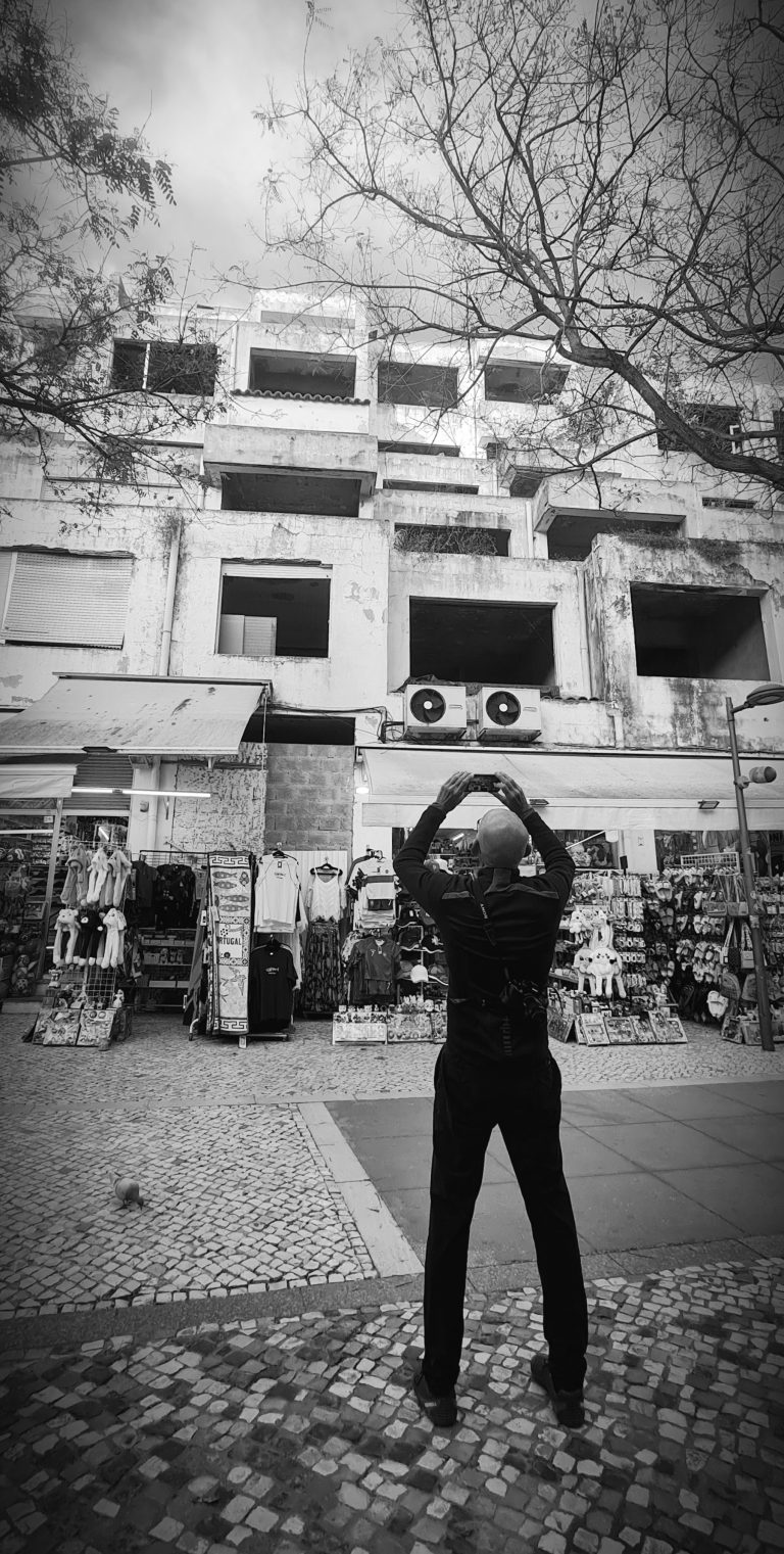 Street photo in Albufeira, Portugal by Rodrigo Marcotich