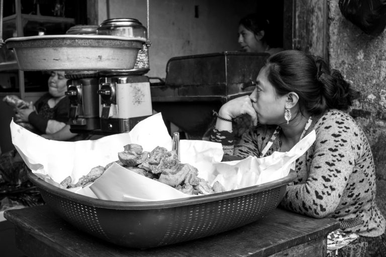 Street photo in Santa María de Jesús, Guatemala by Duncan Aitken