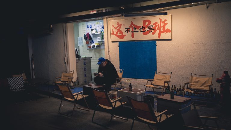 Street photo in Wuhan, China by Tan Jian