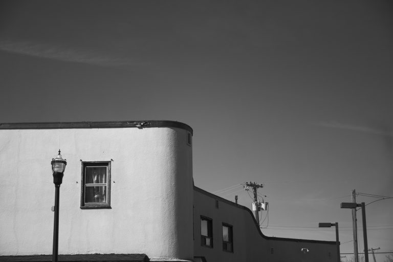 Street photo in Winnipeg Beach, Canada by Mike Carter