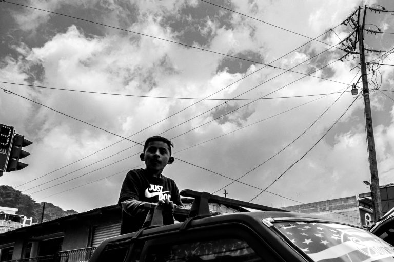 Street photo in Nahuala, Guatemala by Duncan Aitken