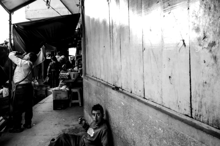 Street photo in Nahuala, Guatemala by Duncan Aitken