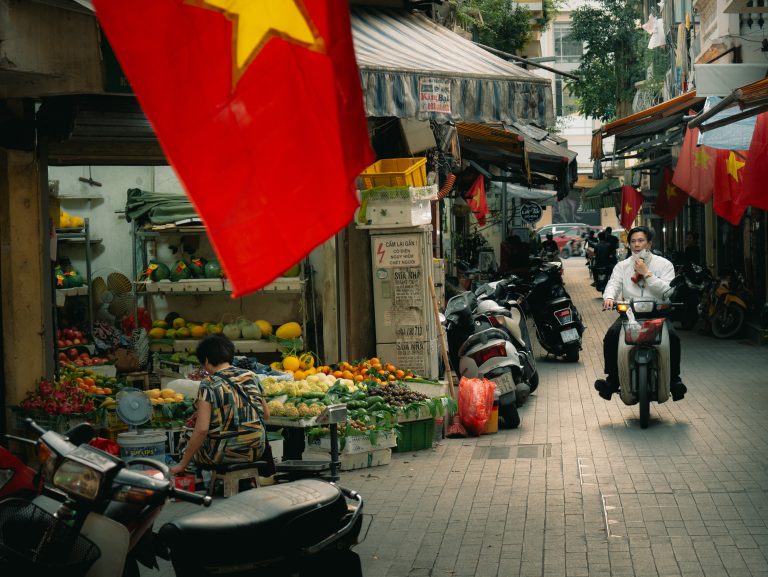 Street photo in Hanoi, Vietnam by James Dunn