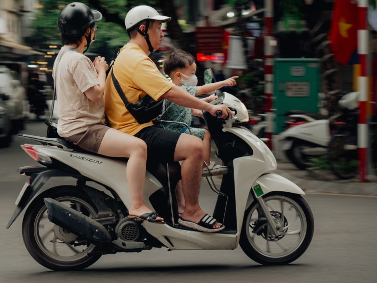 Street photo in Hanoi, Vietnam by James Dunn