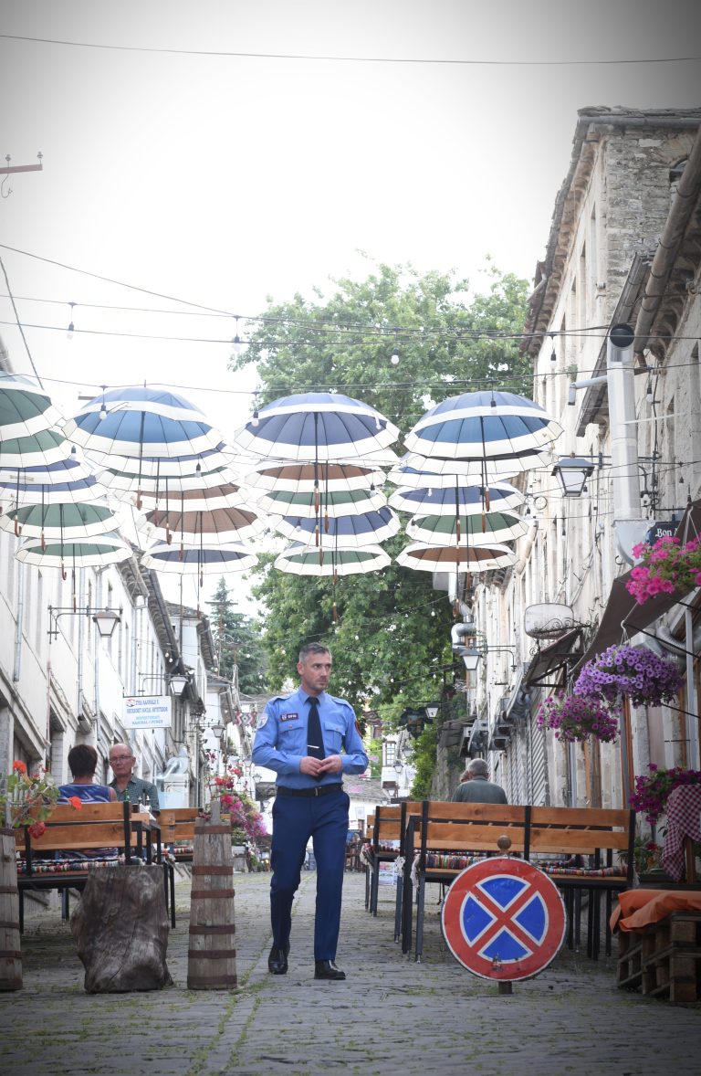 Street photo in Gjirokaster, Albania by Rodrigo Marcotich