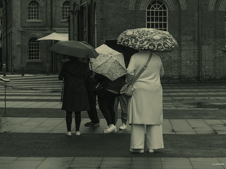 Street photo in Newcastle, Australia by Peter Varnay