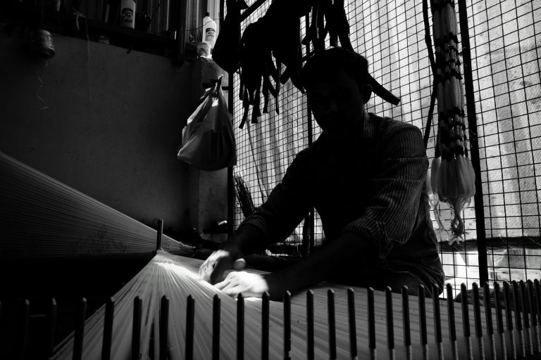 Street photo in Bhoodan Pochampally, India by Tanwir Mir
