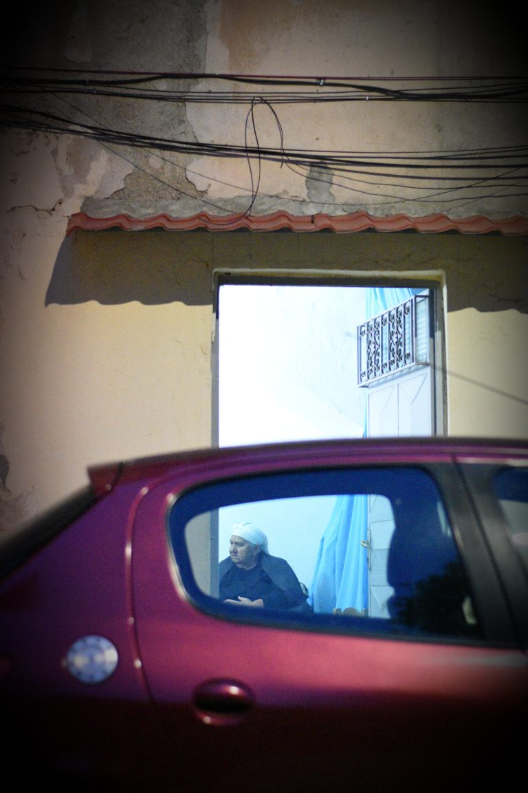 Street photo in Korçë, Albania by Rodrigo Marcotich