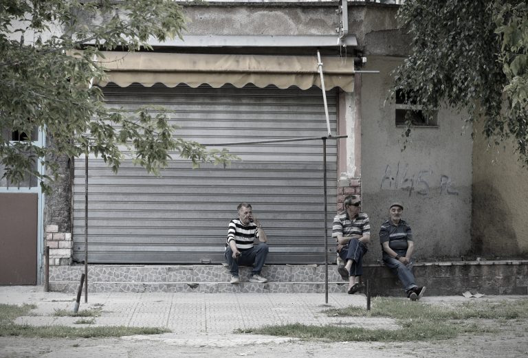 Street photo in Korçë, Albania by Rodrigo Marcotich