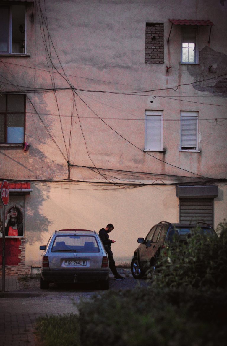 Street photo in Korçë, Albania by Rodrigo Marcotich