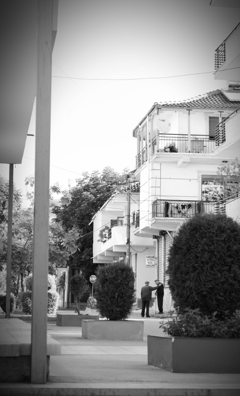 Street photo in Korçë, Albania by Rodrigo Marcotich