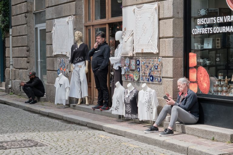 Street photo in Saint-Malo, France by John Lanagan
