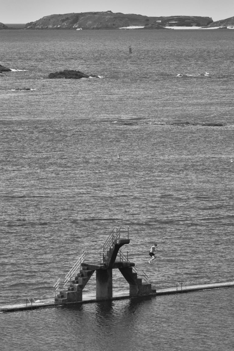 Street photo in Saint-Malo, France by John Lanagan