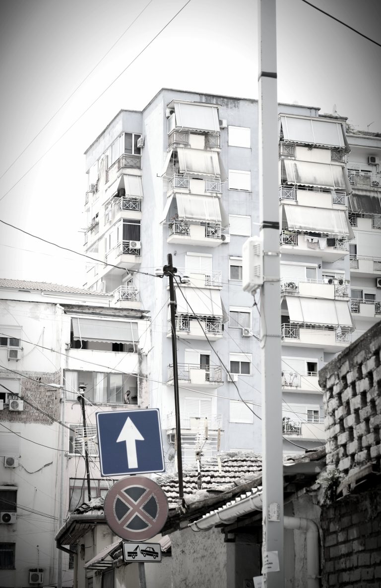 Street photo in Tirana, Albania by Rodrigo Marcotich