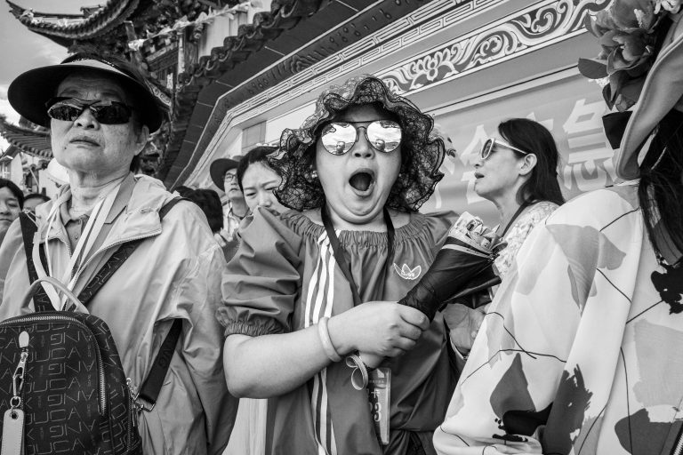 Street photo in Dali, China by Craig Meakin